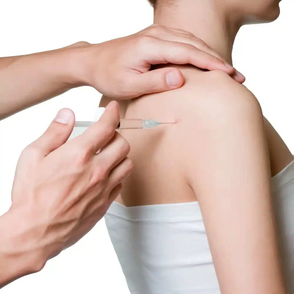 pain management injection ona patient's shoulder