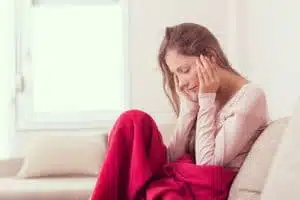 woman having an issue with headaches