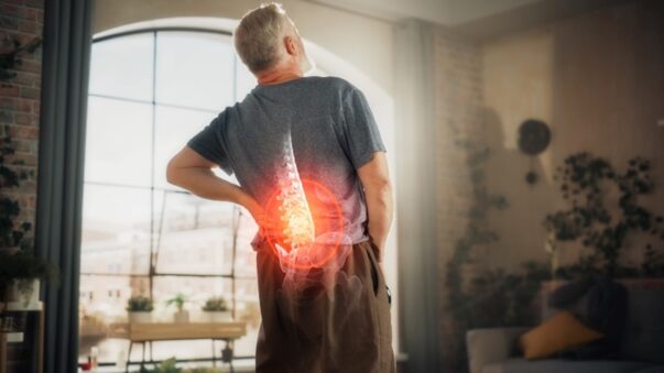 Man Experiencing Back Pain, Spine and Rehabilitation Center in Houston