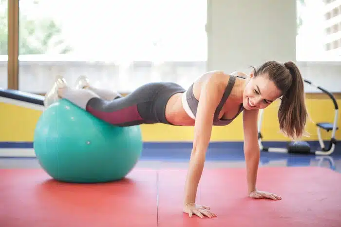 woman using a therapy ball